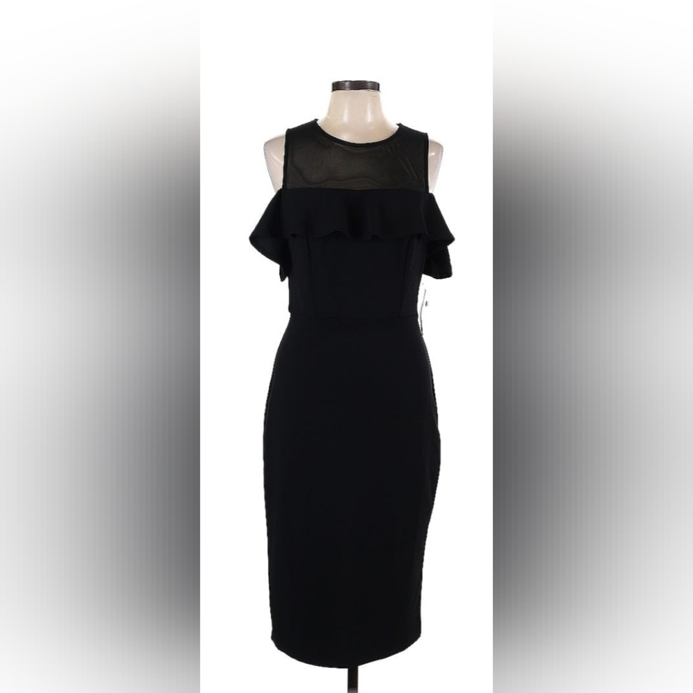 Black cocktail dress. Premier Amour